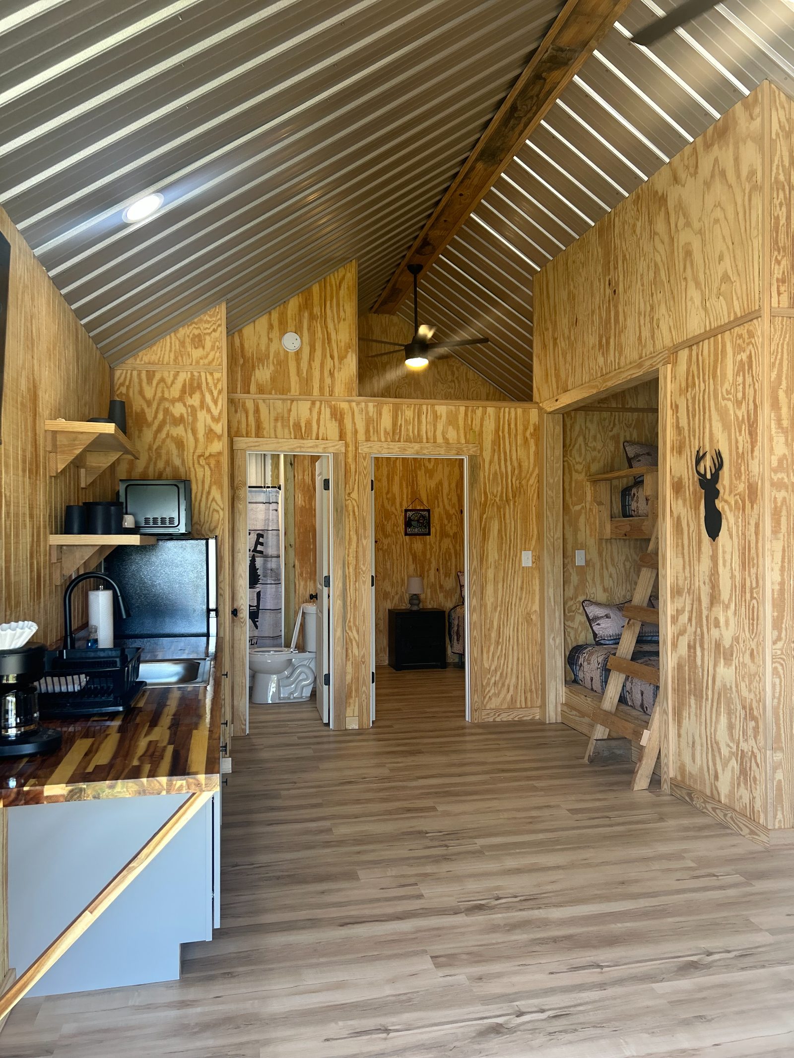 Kitchen and built-in bunk beds inside a larger Buckhill cabin