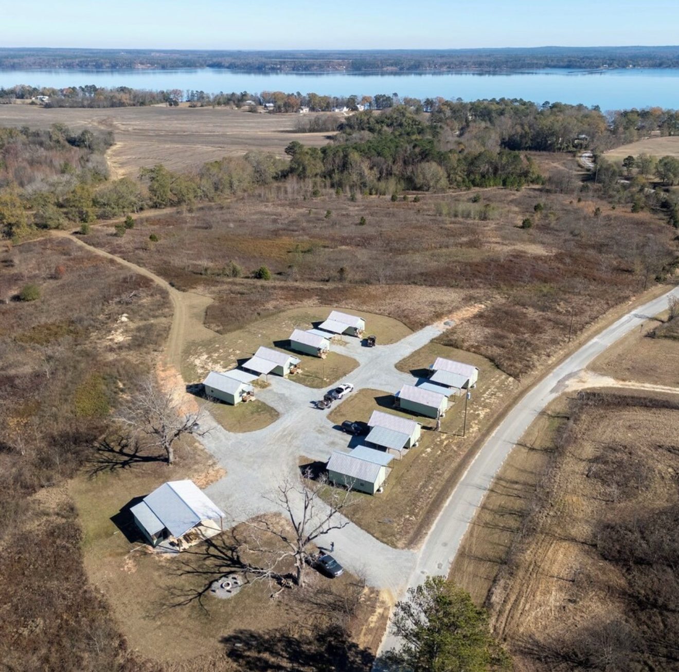 Aerial view of the Buckhill Cabins property with the lake beyond